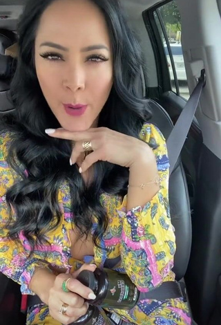 Desirable Norkys Batista Shows Cleavage in a Car (Side Boob)