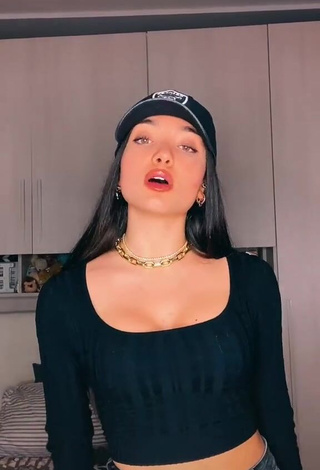 Hottie Mariasole Pollio Shows Cleavage in Black Crop Top