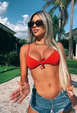 1. Sexy Raffaela Souza Shows Cleavage in Orange Bikini Top