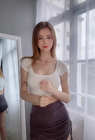 Hot Stella Kelbert Shows Cleavage in White Crop Top