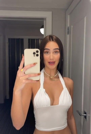 Desirable Suede Brooks Shows Cleavage in White Crop Top (Side Boob)