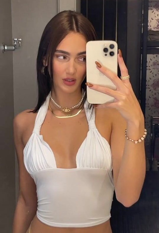 4. Sexy Suede Brooks Shows Cleavage in White Crop Top (Side Boob)