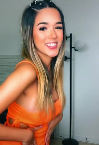 4. Hot Susana Torres Shows Cleavage in Orange Dress