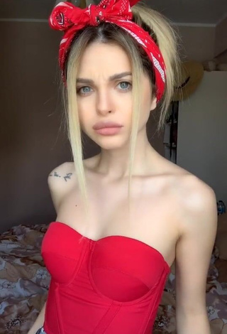 Sexy Valerie Lungu Shows Cleavage in Red Corset