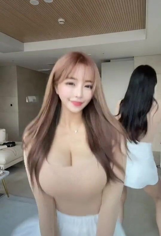 4. Sweetie velymom Shows Cleavage in Beige Top