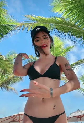 Hot Vee Castro Shows Cleavage in Black Bikini