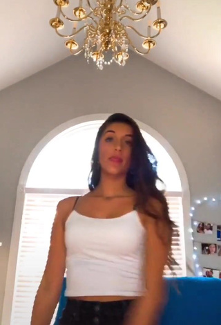 Pretty Taylor Mackenzie Shows Cleavage in White Crop Top