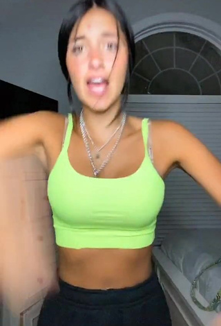 Cute Taylor Mackenzie Shows Cleavage in Lime Green Sport Bra