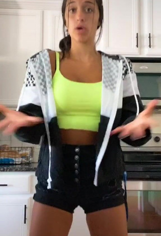 4. Sweetie Taylor Mackenzie Shows Cleavage in Lime Green Crop Top