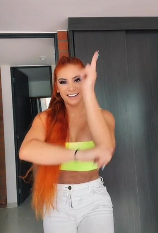 Sexy Yeimy Serrano Shows Cleavage in Lime Green Crop Top