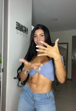 Yesli Gómez Shows Cleavage in Appealing Blue Crop Top