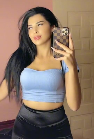 1. Cute Zekiye Shows Cleavage in Blue Crop Top