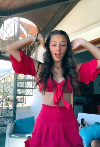 Beautiful Brunella Cacciuni Shows Cleavage in Sexy Pink Crop Top