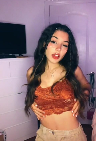 Hot Alejandra Olivera Shows Cleavage in Orange Tube Top