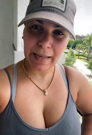 Sweetie arysbella_1 Shows Cleavage on the Balcony