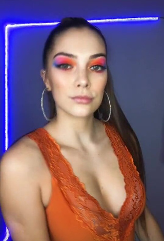 1. Hot Azul Granton Shows Cleavage in Orange Top