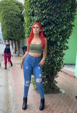 1. Sexy Jissela López Shows Cleavage in Olive Crop Top in a Street