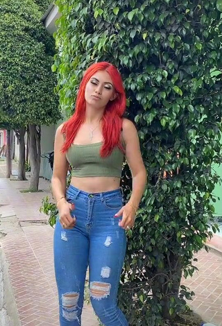 Sexy Jissela López Shows Cleavage in Olive Crop Top in a Street