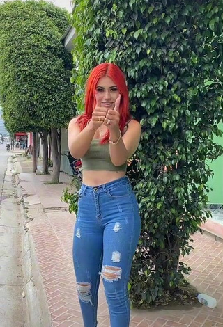 3. Sexy Jissela López Shows Cleavage in Olive Crop Top in a Street