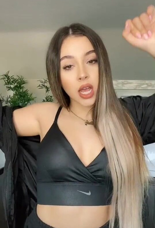 Sexy Bianca Lixandru Shows Cleavage in Black Sport Bra