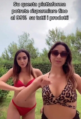 Sexy Cora & Marilù Shows Cleavage in Red Bikini