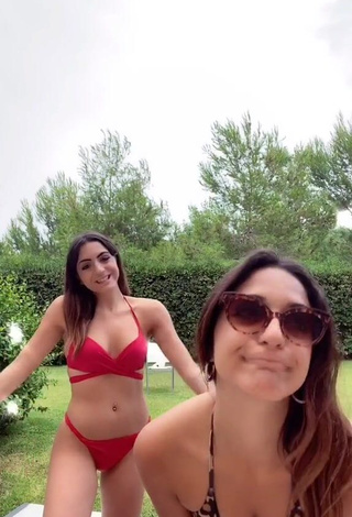 Hot Cora & Marilù Shows Cleavage in Red Bikini