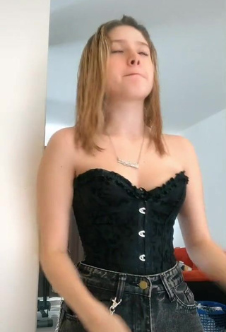 4. Sweetie Daniela Shows Cleavage in Black Corset