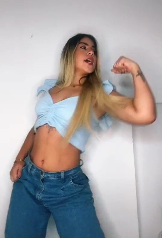 3. Gorgeous Chantall Pizzino Shows Cleavage in Alluring Blue Crop Top
