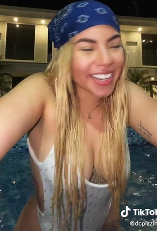3. Hot Chantall Pizzino Shows Cleavage in White Swimsuit at the Pool