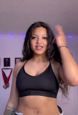 Hot Dellecia Ann Marie Ethier Shows Cleavage in Black Crop Top