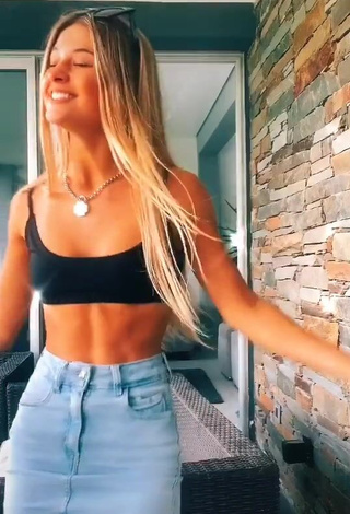 1. Sweetie Emiestoco Shows Cleavage in Black Crop Top