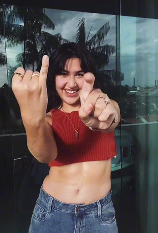 Cute Evelyn Félix Shows Cleavage in Red Crop Top