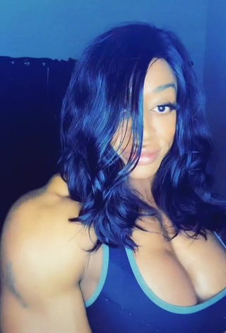 3. Desirable Monique Jones Shows Cleavage in Blue Crop Top