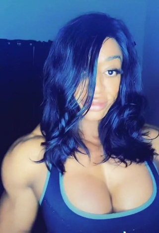 4. Desirable Monique Jones Shows Cleavage in Blue Crop Top