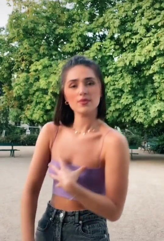 1. Sexy Fleur Shows Cleavage in Purple Crop Top