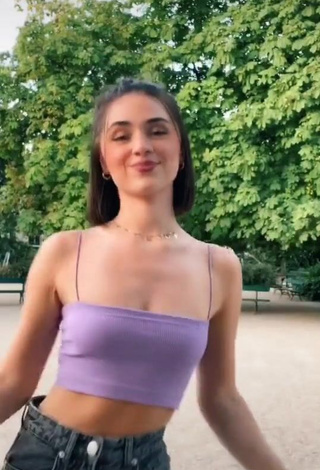 4. Sexy Fleur Shows Cleavage in Purple Crop Top