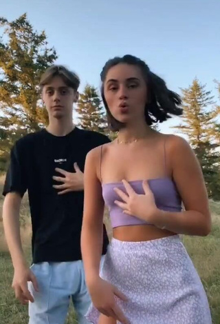 Cute Fleur Shows Cleavage in Purple Crop Top