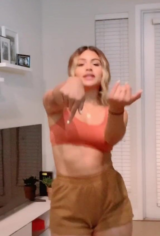 1. Magnetic Gabriela Bandy Shows Cleavage in Appealing Orange Crop Top and Bouncing Boobs