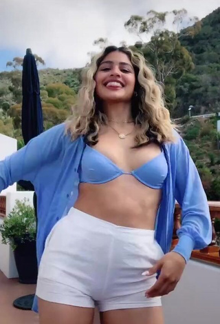 2. Sexy Gabriela Bandy Shows Cleavage in White Bikini Top