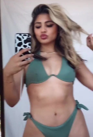 2. Hot Gabriela Bandy Shows Cleavage in Green Bikini