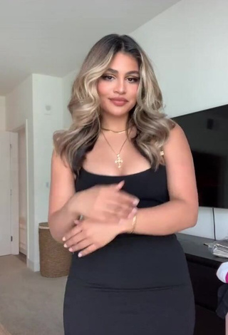 Sexy Gabriela Bandy Shows Cleavage in Black Dress