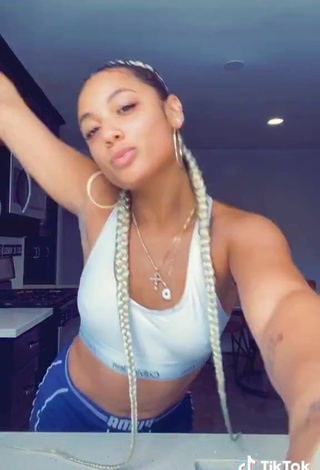 4. Desirable DaniLeigh Shows Cleavage in White Crop Top