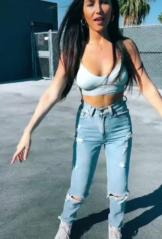 4. Sexy Iris Shows Cleavage in Blue Crop Top