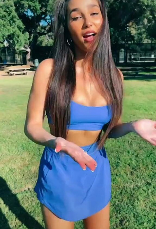 3. Hot Iris Shows Cleavage in Blue Crop Top