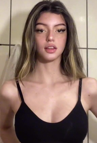 Hot Julia Turati Shows Cleavage in Black Crop Top