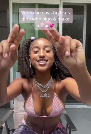 Hot Kyla Imani Shows Cleavage in Pink Bikini Top