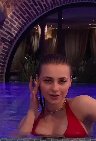 Hot Irina Lazutchikova Shows Cleavage in Red Bikini at the Pool