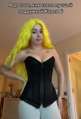 Desirable Makeeva Shows Cleavage in Black Corset