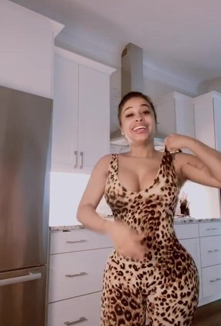 1. Desirable DreamDoll Shows Cleavage in Leopard Bodysuit