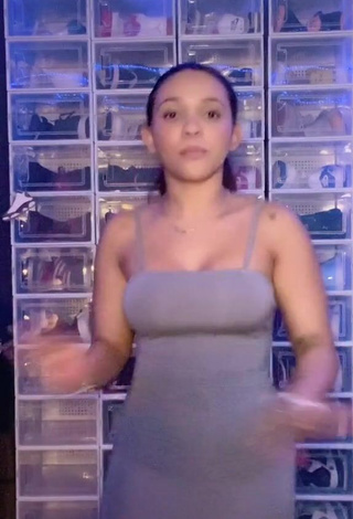 4. Beautiful River Bleu Shows Cleavage in Sexy Grey Dress